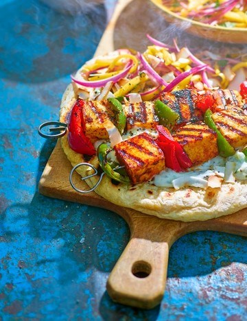 Chilli paneer skewers with coconut raita and mango salad