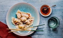 Chinese jiaozi dumplings with a Sichuanese sauce
