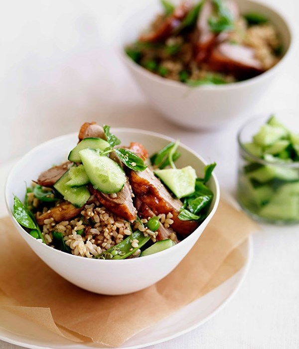 Chinese roast duck with brown rice, peas and cucumber