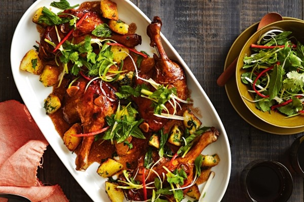 Chinese-style braised duck legs with crispy potatoes