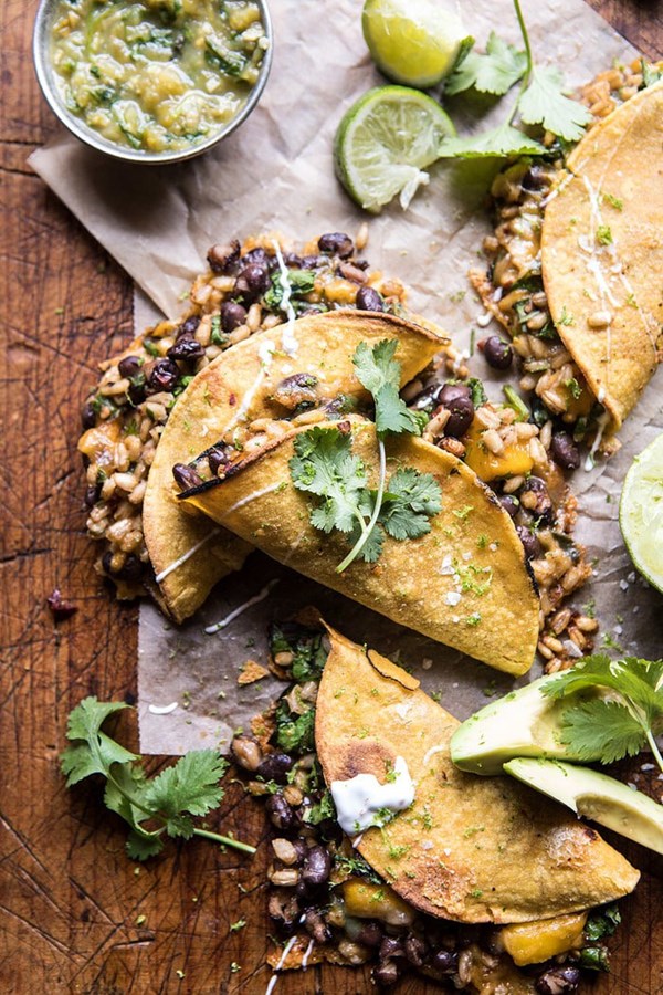Chipotle black bean, brown rice, and mango quesadillas