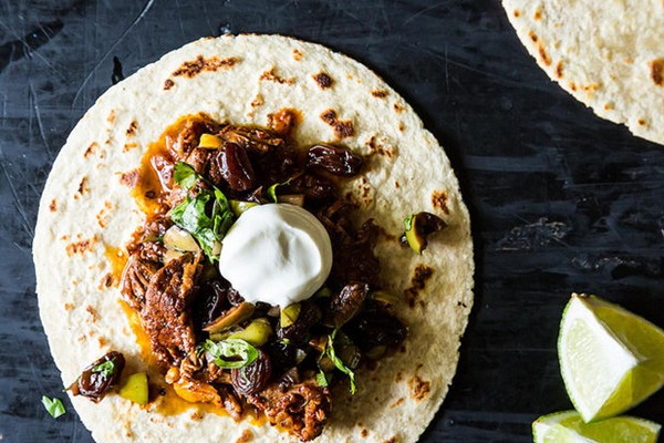 Chipotle braised lamb tacos with balsamic-soaked raisins