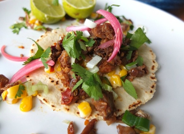 Chipotle goat tacos with sour creamed corn