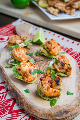 Chipotle lime grilled shrimp and corn guacamole mini tostadas