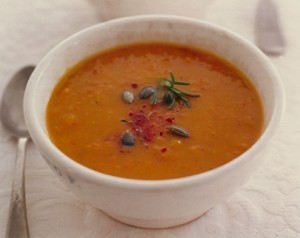 Chipotle-squash soup with fresh rosemary and toasted pumpkin seeds