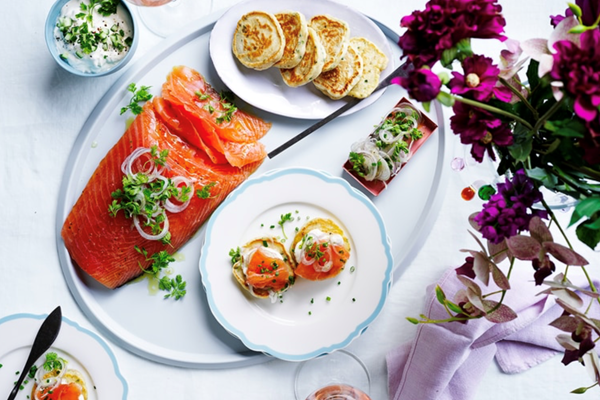 Chive blinis with gin-spiked salmon and cucumber cream