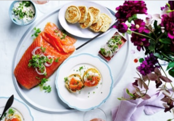 Chive blinis with gin-spiked salmon and cucumber cream