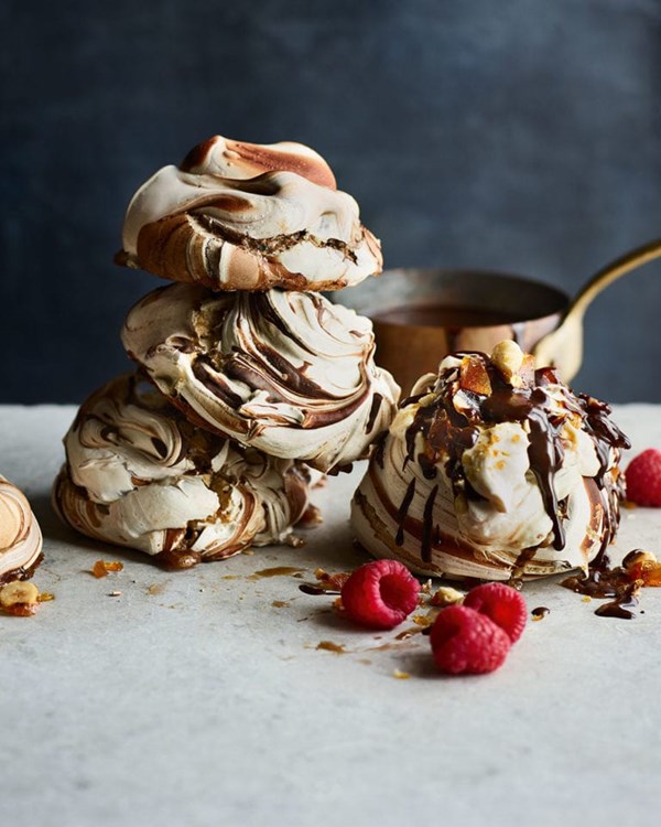 Choc swirl and brown sugar meringues with praline and chocolate caramel sauce