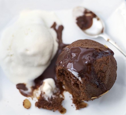 Chocolate and almond puds with boozy hot chocolate sauce