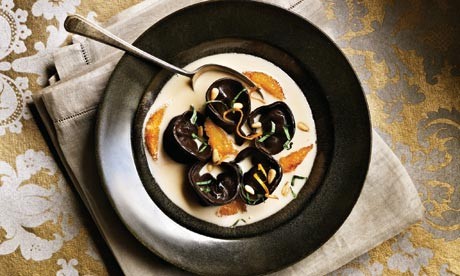 Chocolate and almond tortellini with blood oranges and pine nuts