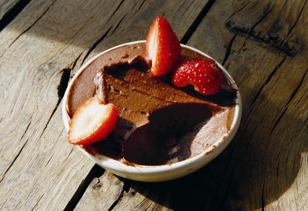Chocolate and avocado mousse with honeyed strawberries
