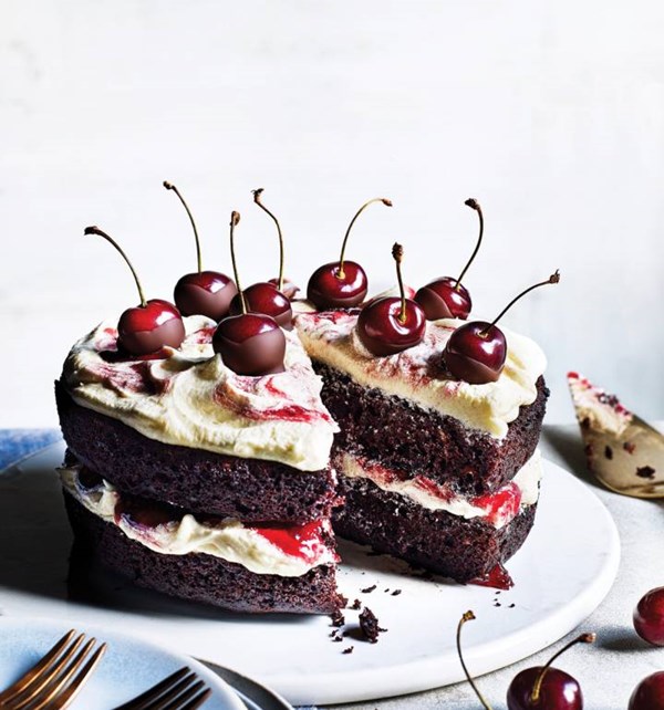 Chocolate and cherry layer cake with vanilla frosting