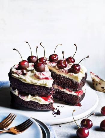 Chocolate and cherry layer cake with vanilla frosting