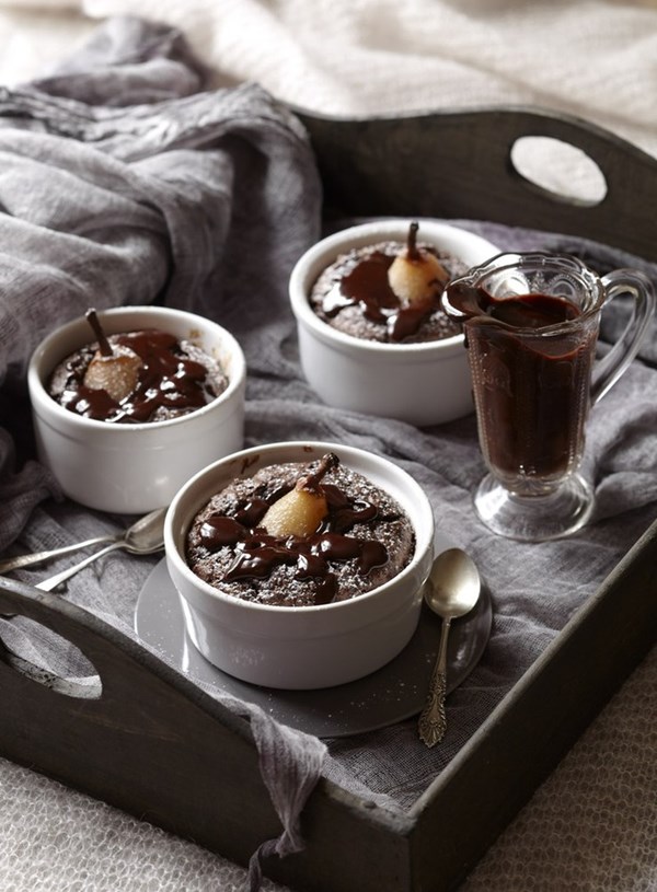 Chocolate and poached pear puddings with chocolate sauce