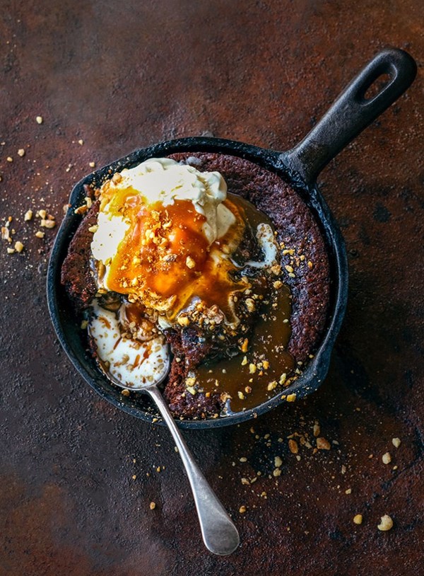 Chocolate and walnut self-saucing pudding with salted caramel sauce