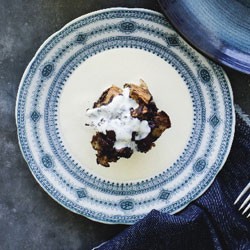 Chocolate bread and butter puddings with vanilla cream
