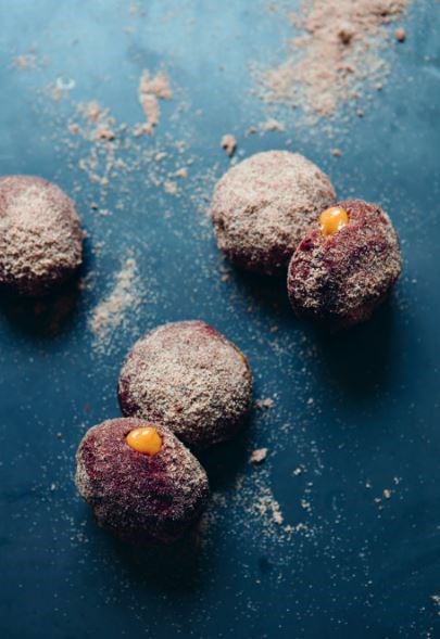 Chocolate brioche doughnuts with bay caramel custard and nib sugar