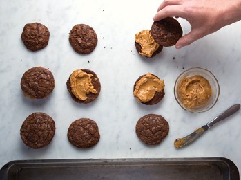 Chocolate brownie sandwich cookies with peanut butter filling