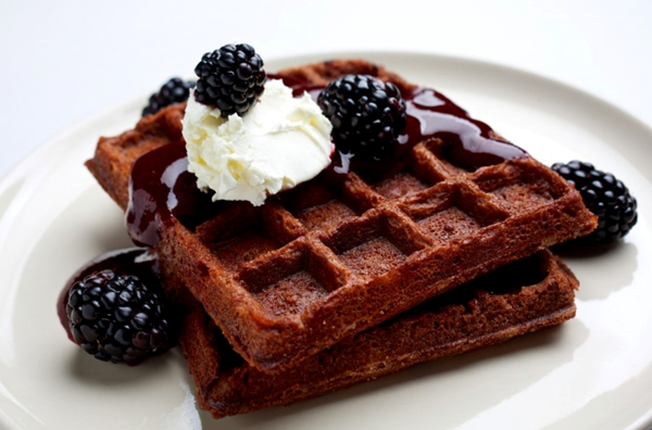 Chocolate brownie waffles with blackberry sauce
