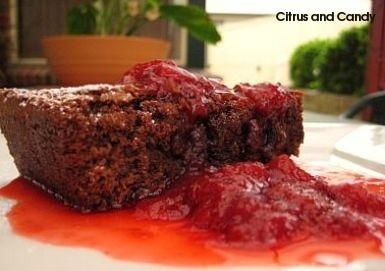 Chocolate brownies with strawberry sauce