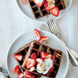 Chocolate buckwheat waffles with juicy berries