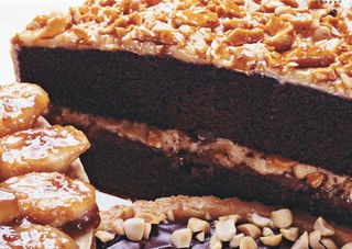 Chocolate cake with milk chocolate-peanut butter frosting and peanut butter brittle