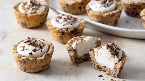 Chocolate chip cookie cups [vanilla cream cheese filling; vanilla bean swirl]