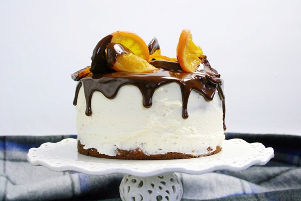 Chocolate clementine marble layer cake with marmalade ganache and candied oranges