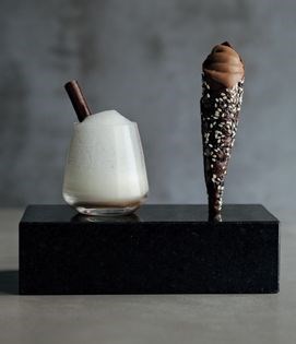 Chocolate cone with warm banana milk