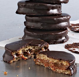 Chocolate-covered sandwich cookies with dulce de leche (Alfajores)
