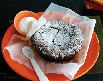 Chocolate cranberry cakes with bourbon whipped cream