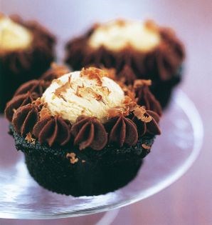Chocolate cupcakes stuffed with pistachio ice cream
