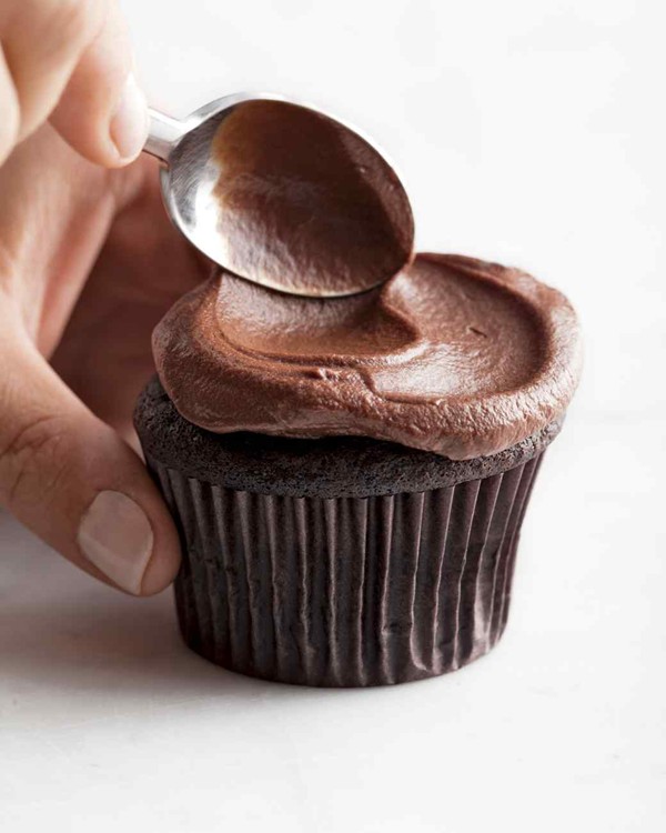 Chocolate cupcakes with whipped ganache frosting