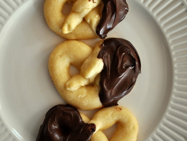 Chocolate dipped almond pretzel cookies