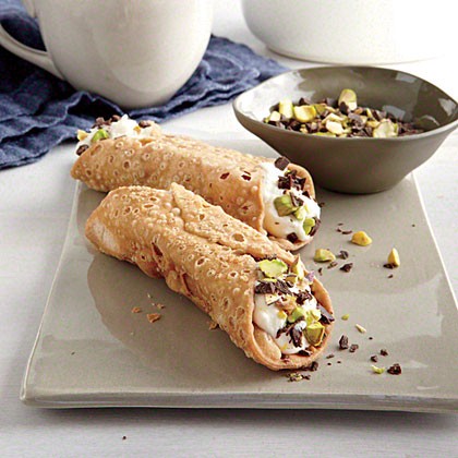 Chocolate-dipped cannoli with pistachios