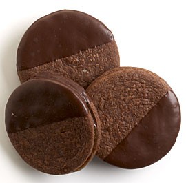 Chocolate-dipped chocolate-apricot sandwich cookies