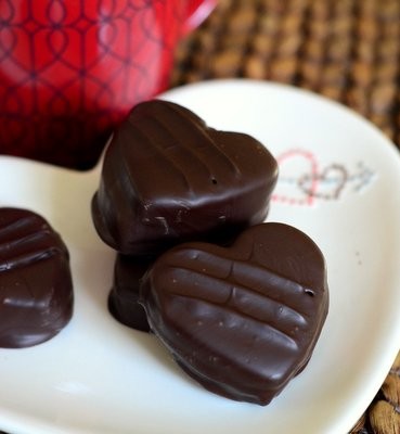 Chocolate-dipped chocolate caramel sandwich cookies