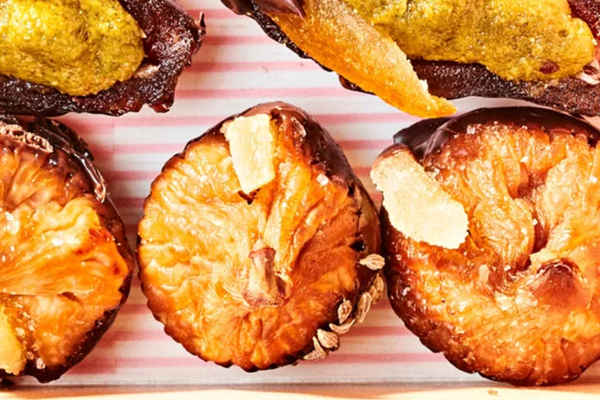 Chocolate-dipped dried figs with anise seeds