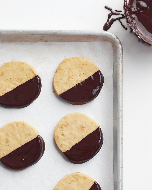 Chocolate-dipped macadamia cookies