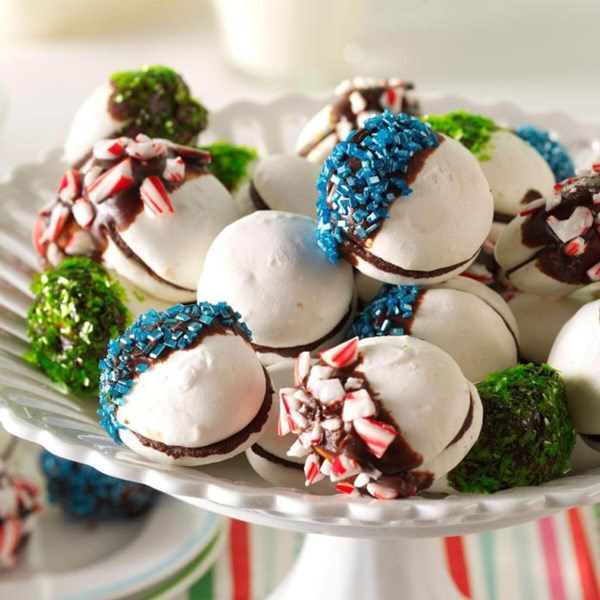 Chocolate-dipped meringue sandwich cookies