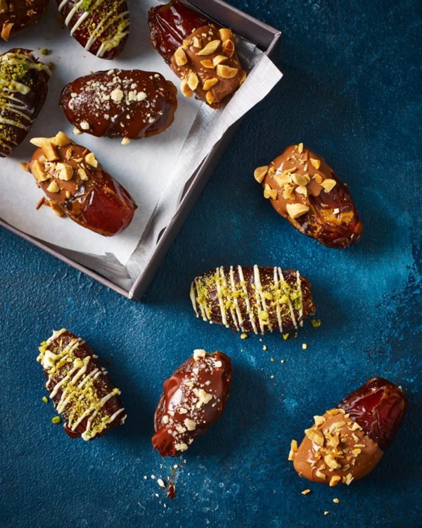 Chocolate dipped nut-stuffed dates