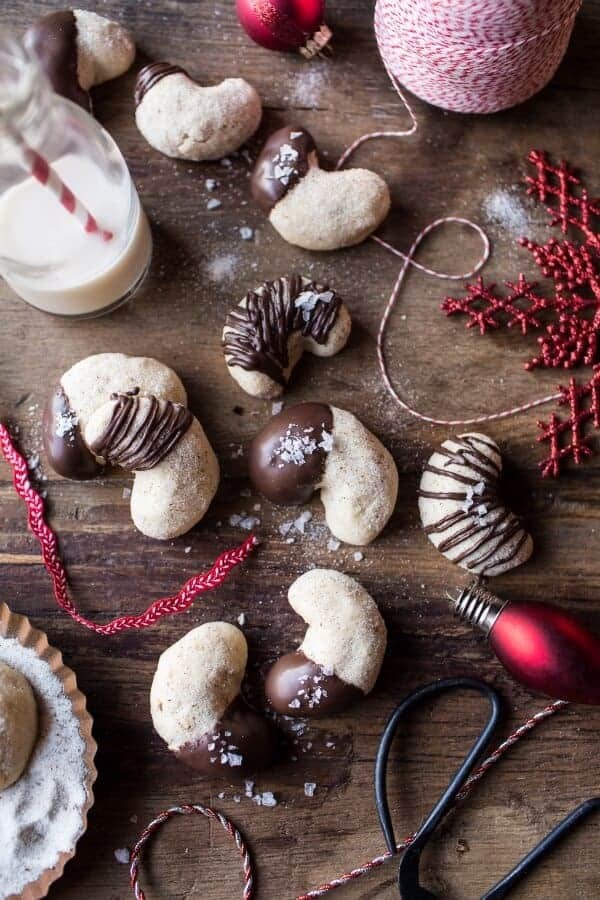 Chocolate dipped vanilla bean cashew crescent cookies