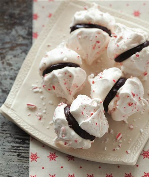 Chocolate-filled peppermint meringue sandwiches