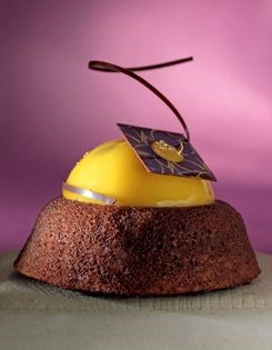 Chocolate financier with passion fruit curd