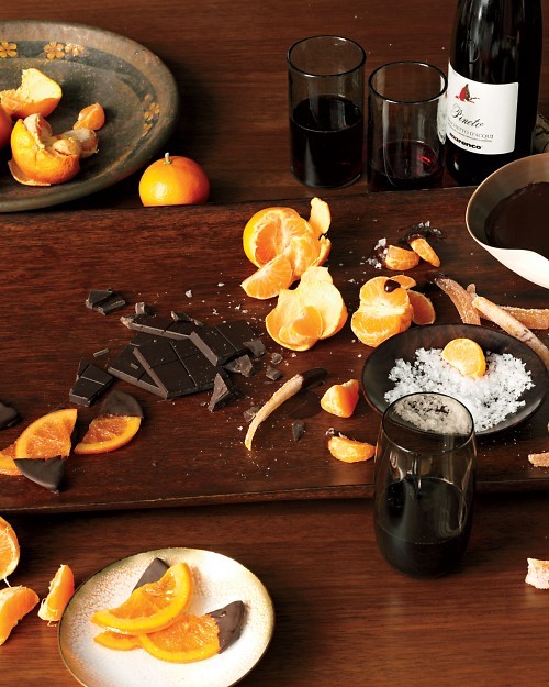 Chocolate fondue with clementines, candied grapefruit peel, and glacéed orange slices
