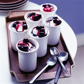 Chocolate fudge pots with blueberries in cassis