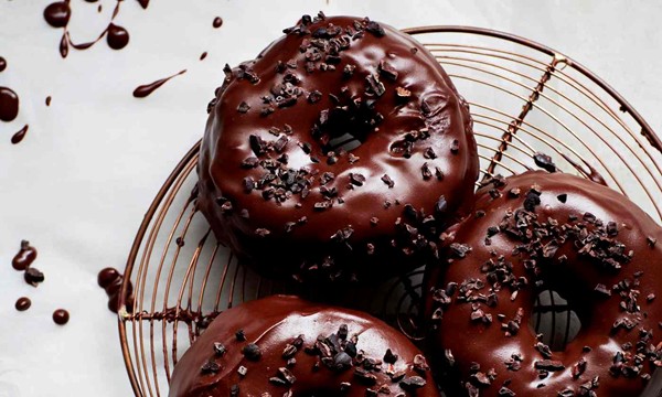 Chocolate ganache glazed doughnuts
