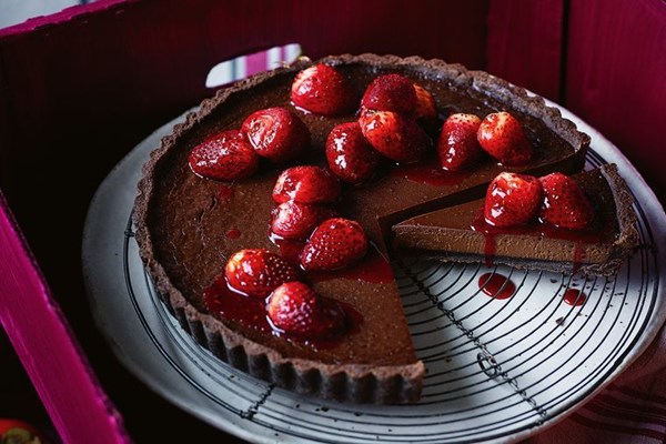 Chocolate ganache tart with roasted strawberries