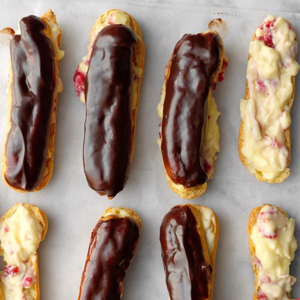 Chocolate-glazed raspberry eclairs