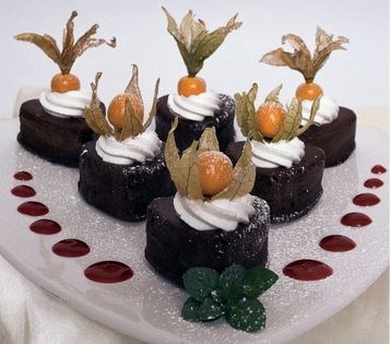 Chocolate hearts with orange cream and cape gooseberries